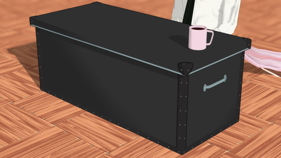 黒い箱とマグカップ