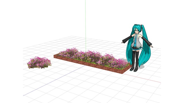 「コスモスの花壇と植え込み」です。